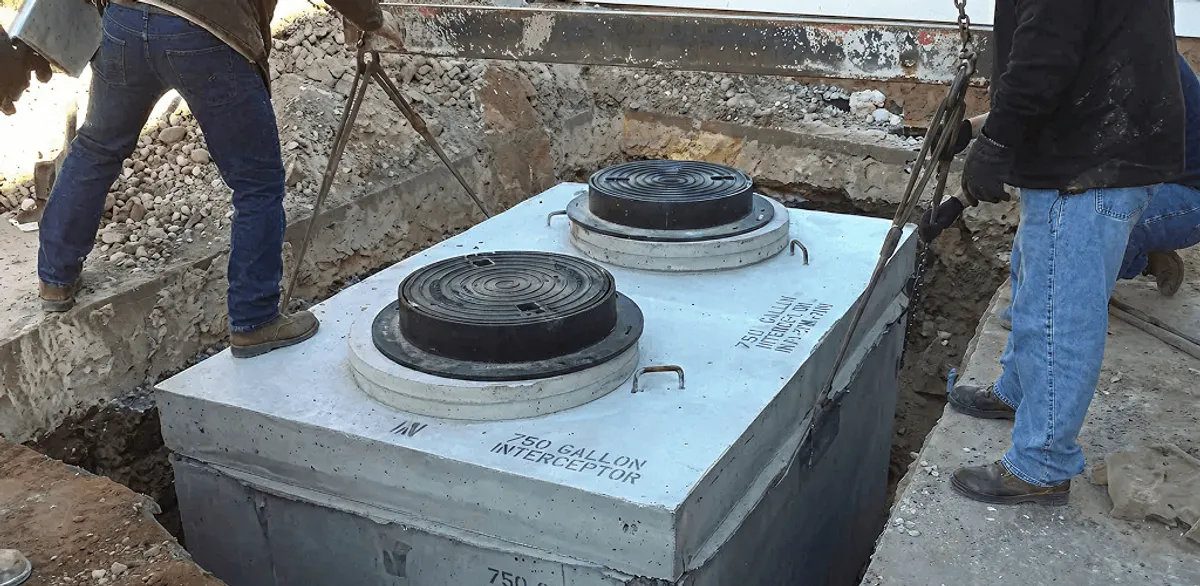 Grease trap installation for a commercial property drainage system in Phoenix, AZ